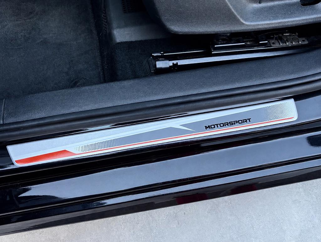 Dekorativn� kryty prah� s n�pisem MOTORSPORT pro �koda Octavia - st��brn�/ oran�ov�