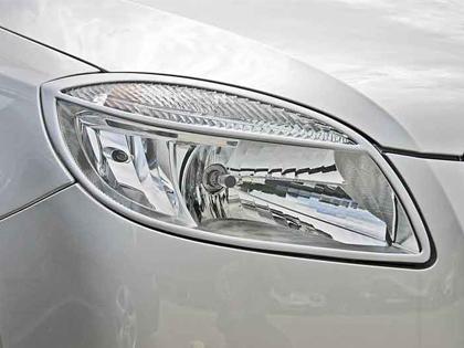Kryty p�edn�ch sv�tel �koda Fabia II - Roomster